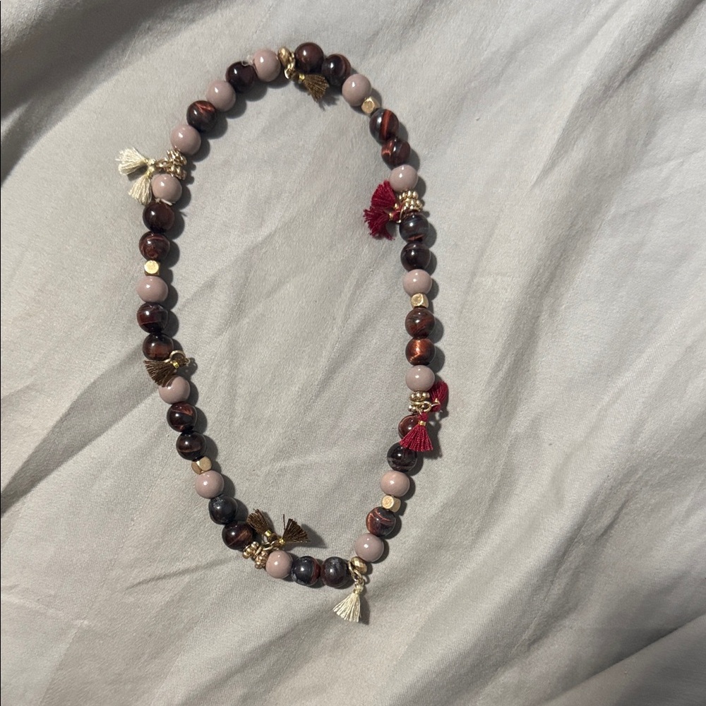 Elegant Beaded Bracelet with Tassels